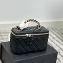 Handbag product photo before background removal — example cutout