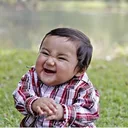 Photo of a laughing baby before background removal — sample image for the HEIC background remover