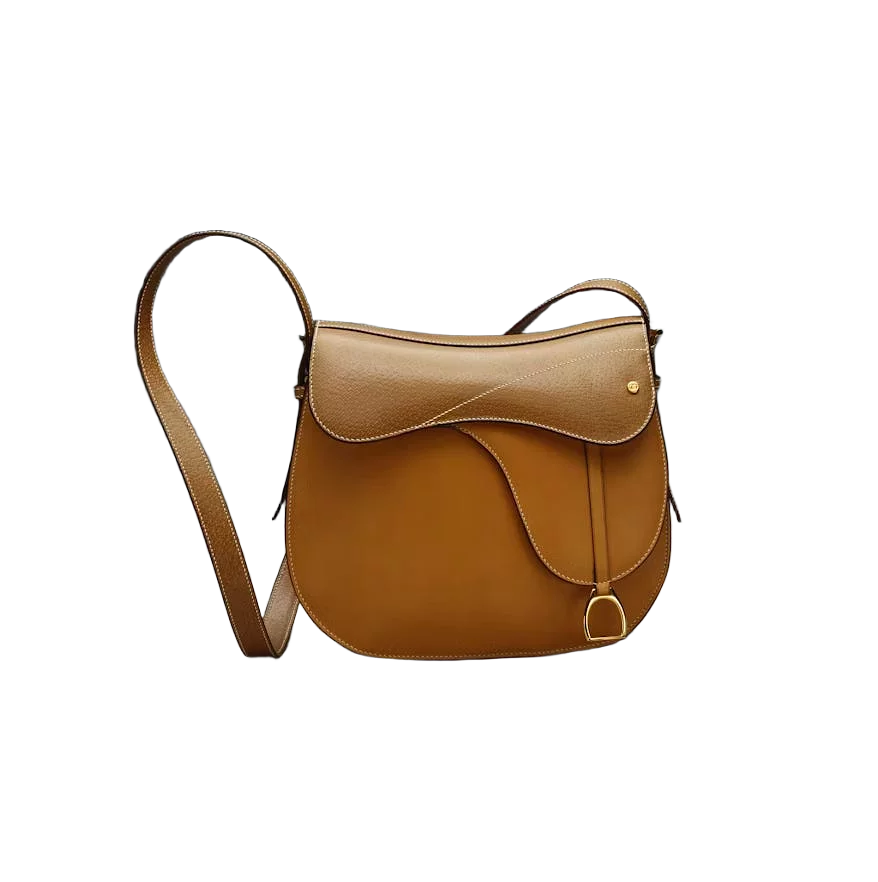 The same product photo after background removal, the bag cut out against transparency