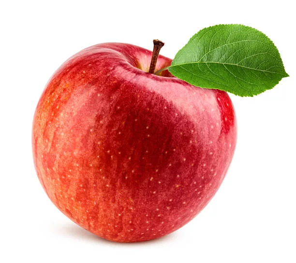 Red apple product photograph before the background was made transparent, with a shadow under it